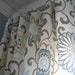 A Pair Of 50x90 Inch Flat Panels On Clip Rings /Rod Pocket Draperies In Pom Pom Spa