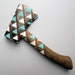 Gold, Aqua, White & Orange Multi-Triangle Hatchet