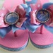 Princess bow flip flops with heel straps -- pink and blue bows