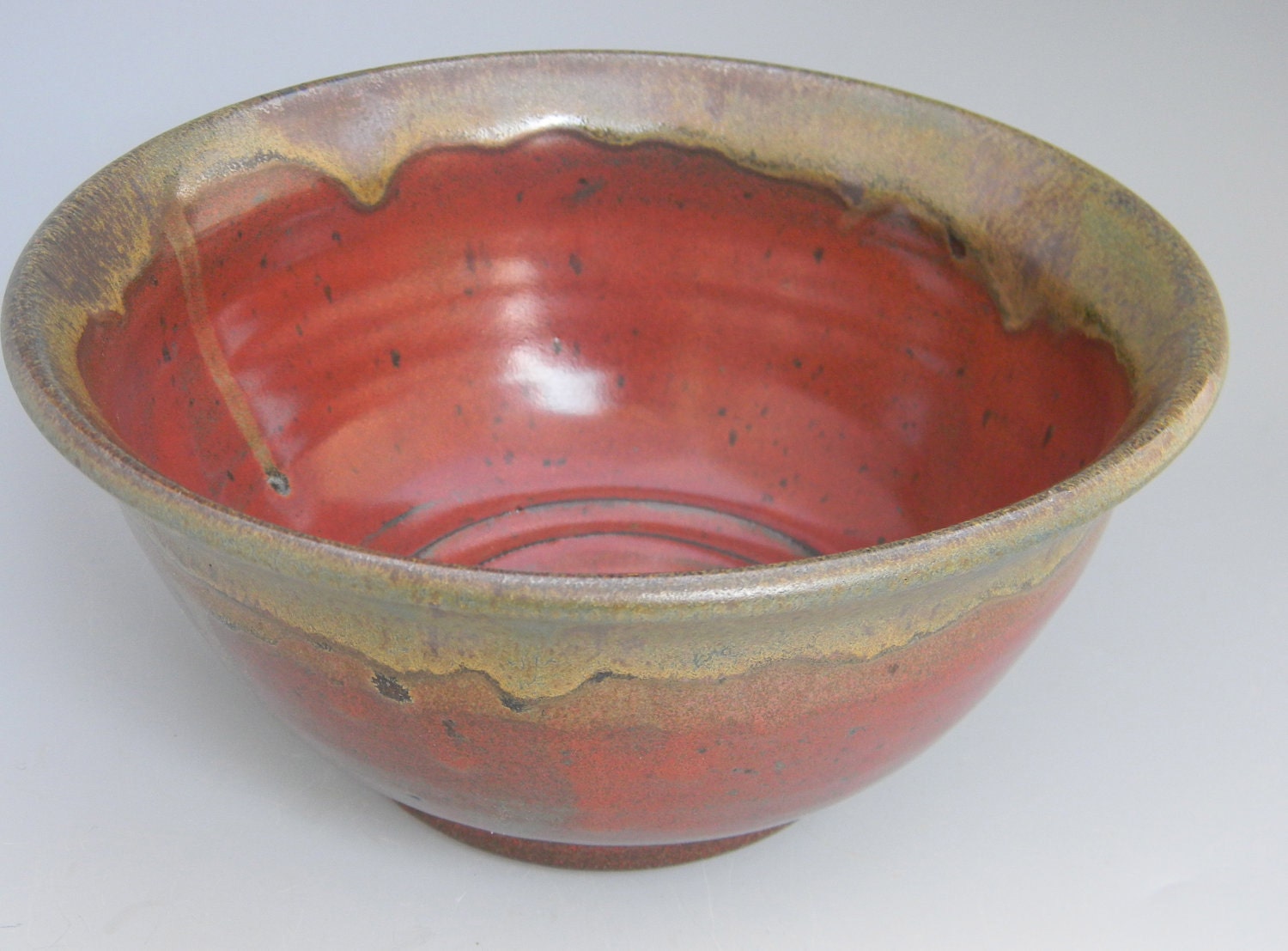 Red glazed stoneware bowl