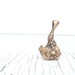 Gnome riding snail pendant necklace in bronze
