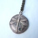 Dragonfly pendant made from vintage button mold out of pure bronze with peridot gemstone