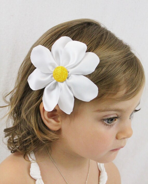Daisy hair clips Our gerbera daisy flower clips are so beautiful and hand crafted. Best quality around!