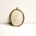 Antique gold picture brass frame with glass and a loop for hanging