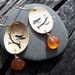 Gold Bird silhouette Earrings. Brass & 14k goldfill. Oval and Orange drops