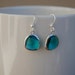 Silver, teal blue and glass