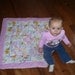 Small baby quilt for car seat or stroller.