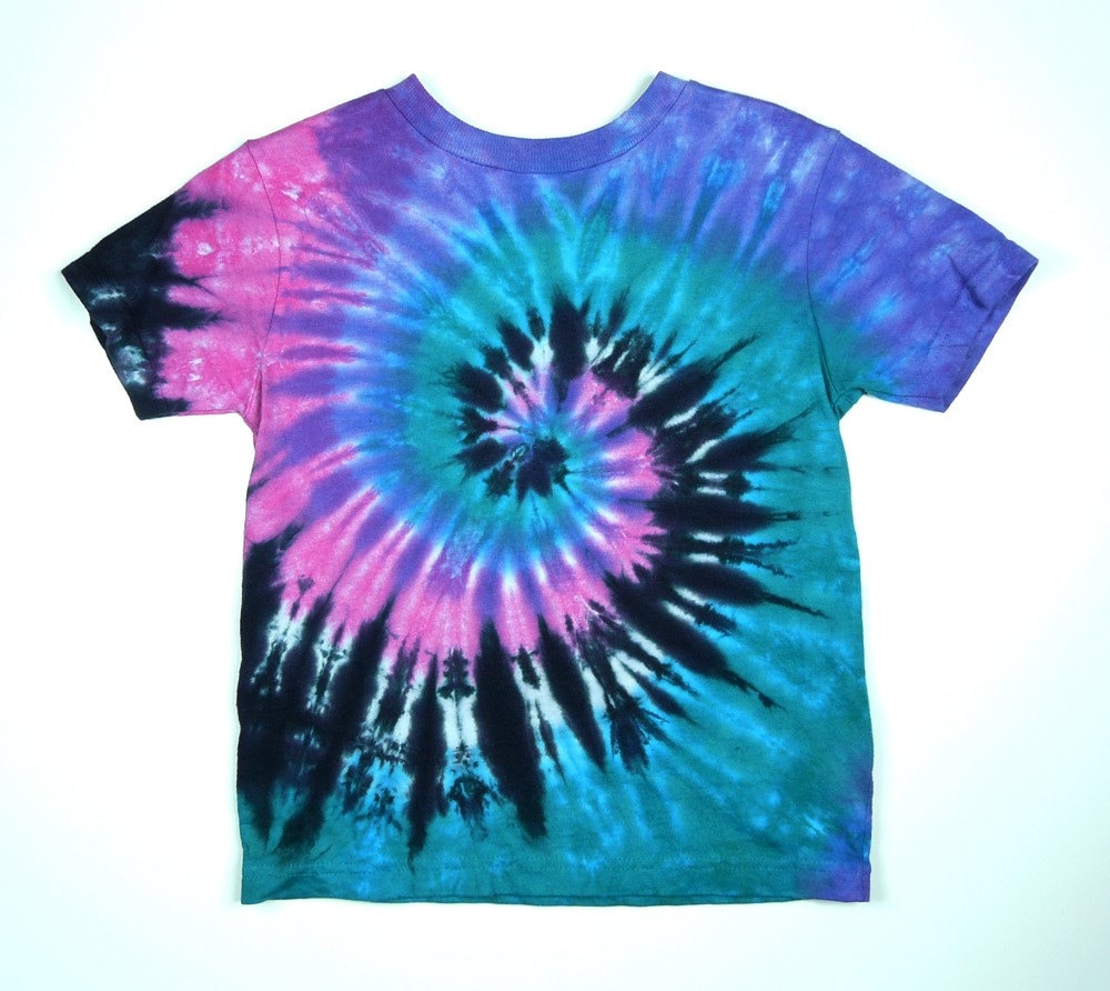 green and pink tie dye shirt