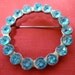 Vintage, Circular 1.5" inch, brooch, pin of blue rhinestone. Good working pin at back. VFM/MISC/12.1-8.10.