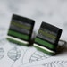 Earrings with black, green, white stripes and sterling silver