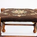 Antique needlepoint prayer and foot stool