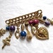 Vintage Brooch with dangly charms beads