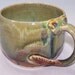 A Ceramic Mug Elephant in the Green Wilderness Coffee Mug