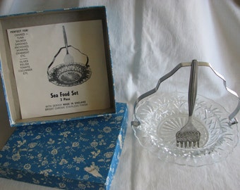 English 1960 Seafood serving dish and fork