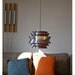 Danish modern hanging lamp. Eames era. 1960s 1970s. Orange and aluminum. Beautiful lighting.
