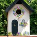 Country Cottage Bird House, Black Roof with Light Cream Sides