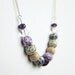 Purple beaded necklace, fabric covered beads