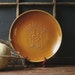 Fraciscan Wheat pattern, dark amber ceramic platter