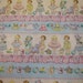 Baby Paper doll fabric retro looking From Fabric Traditions Fabrics 1 yard Licensed Print
