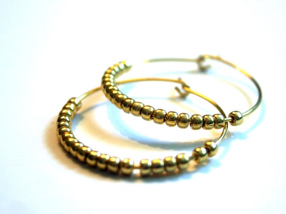 Items similar to Gold beaded hoop earrings on Etsy