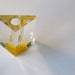 1960s Lucite pyramid, lipstick holder, holographic yellow rose