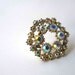Aurora Borealis Snowflake brooch, white hexagonal setting with iridescent rhinestones