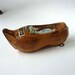 Lourdes souvenir wall hanging, wooden shoe with glow in the dark Mary and castle