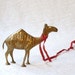 Brass Camel with figures in relief, Middle Eastern curio