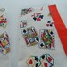 Vintage playing card theme napkins in red, black, green, yellow on white cotton Set of 4