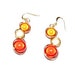 Fall Colors, wire wrapped earrings with red, orange and gold miracle beads, light copper wire and french ear wires.