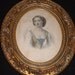 Antique oval guilt frames with hand colourd etching of a woman