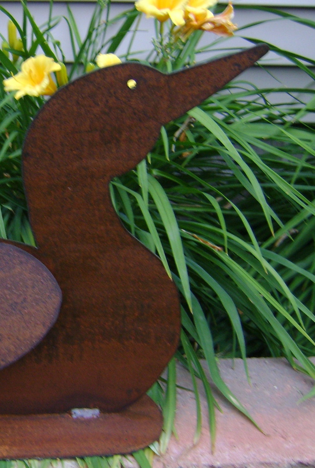 Metal Garden Art sculptured metal loon with rust finish and