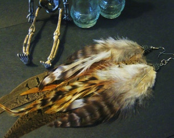 Earth gypsy ( cruelty free long feather earrings) (natural feather earrings)