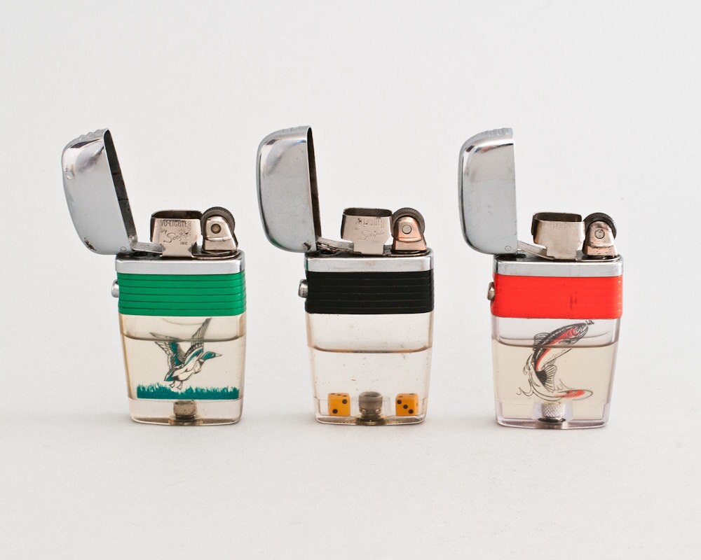 Set of three 1960s Scripto Vu Lighters by LuminousWhatnots