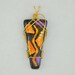 Wire wrapped dichroic glass pendant in 14K gold filled. Unusual and unique