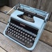 Turquoise Typewriter Underwood Golden Touch DeLuxe Manual by designers Spilman & Braginetz - Treasury Item