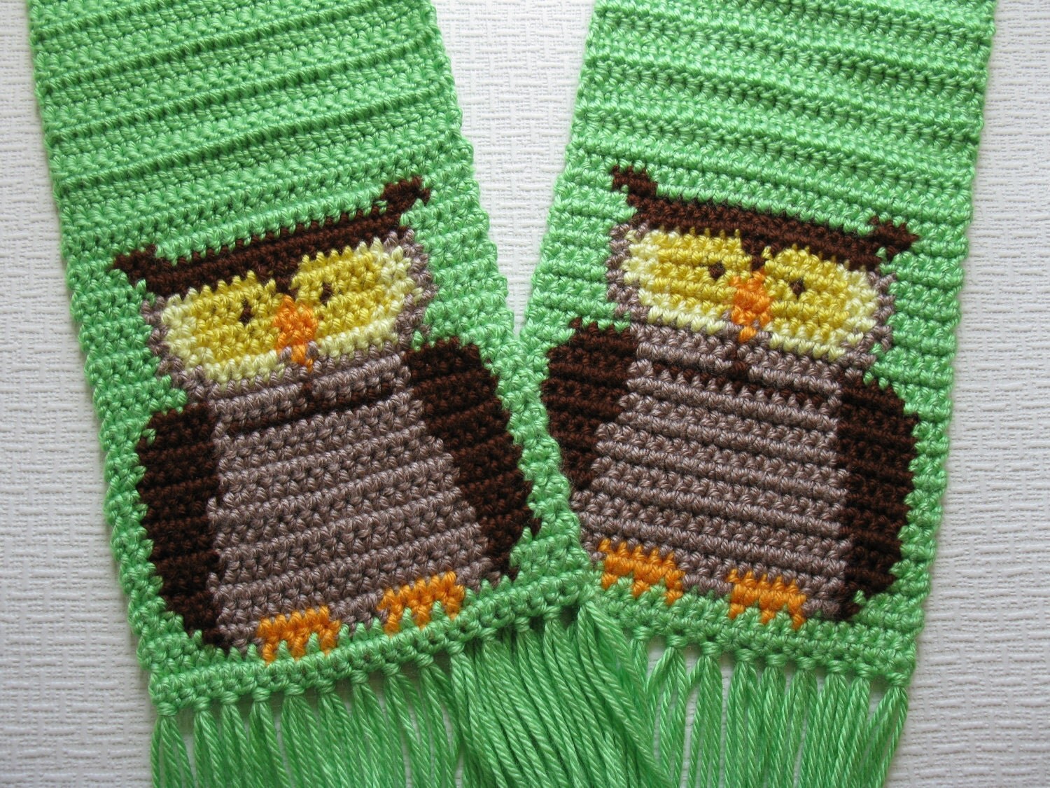 Owl Scarf. Limelight green crochet scarf with brown owls.