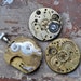 Lot of 3 antique pocket watch movements.