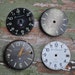 Lot of 4 vintage watch faces.dials.circle