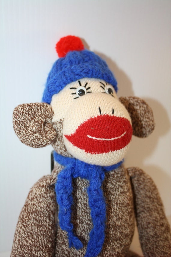 monkey doll with red lips