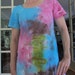 Tie Dye All Cotton T Shirt Dress with Open neck and short sleeves with bursts of Turquoise, Fuchsia, Green and Brown