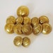 Thirteen New Zealand Shipping Co. brass buttons in three different sizes