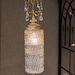 Hollywood Regency lamp cracked ice swag light fixture gilt and crystal with prisms 26" high mid century