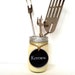 Buttermilk Recycled Mason Jars into Colorful Spring Jars with Chalkboard Tags