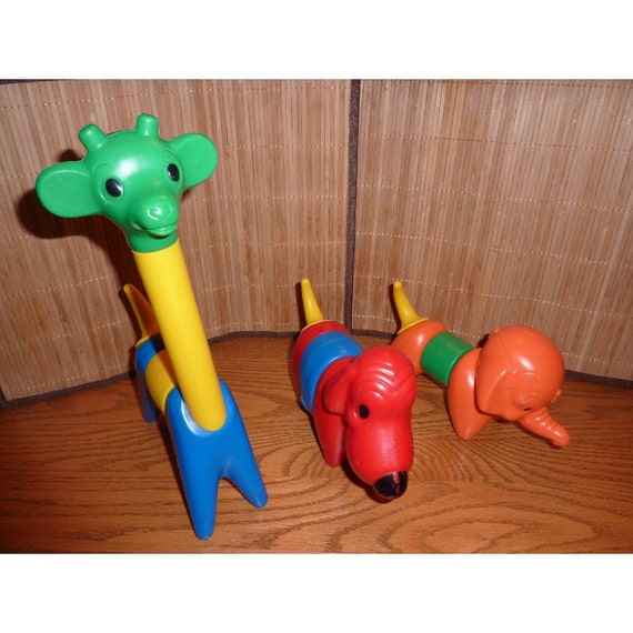 Items similar to Vintage Tupperware Zoo Animal Toys on Etsy