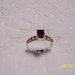 RESERVED For Wanda. REDUCED. Vintage Ruby Solitary and rubies accents ring sz.9. sterling silver.