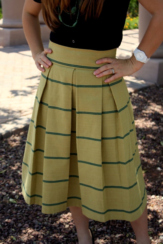 Pleated mustard striped skirt.