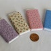Dollhouse Miniature Set of Four Bolts of Fabric - Pastel Assortment