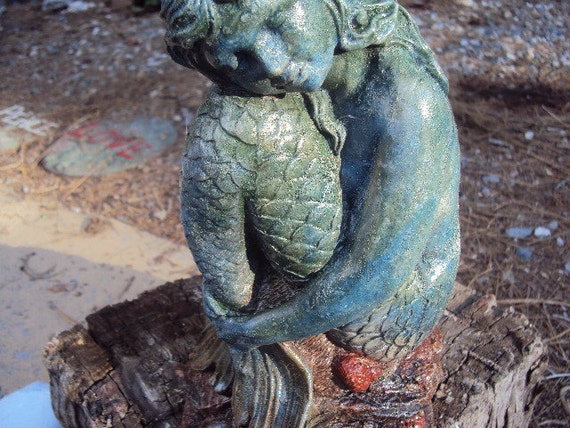 mermaid cement statue