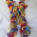 Knitted Ruffle Scarf in bright multi-colored Starbella Yarn